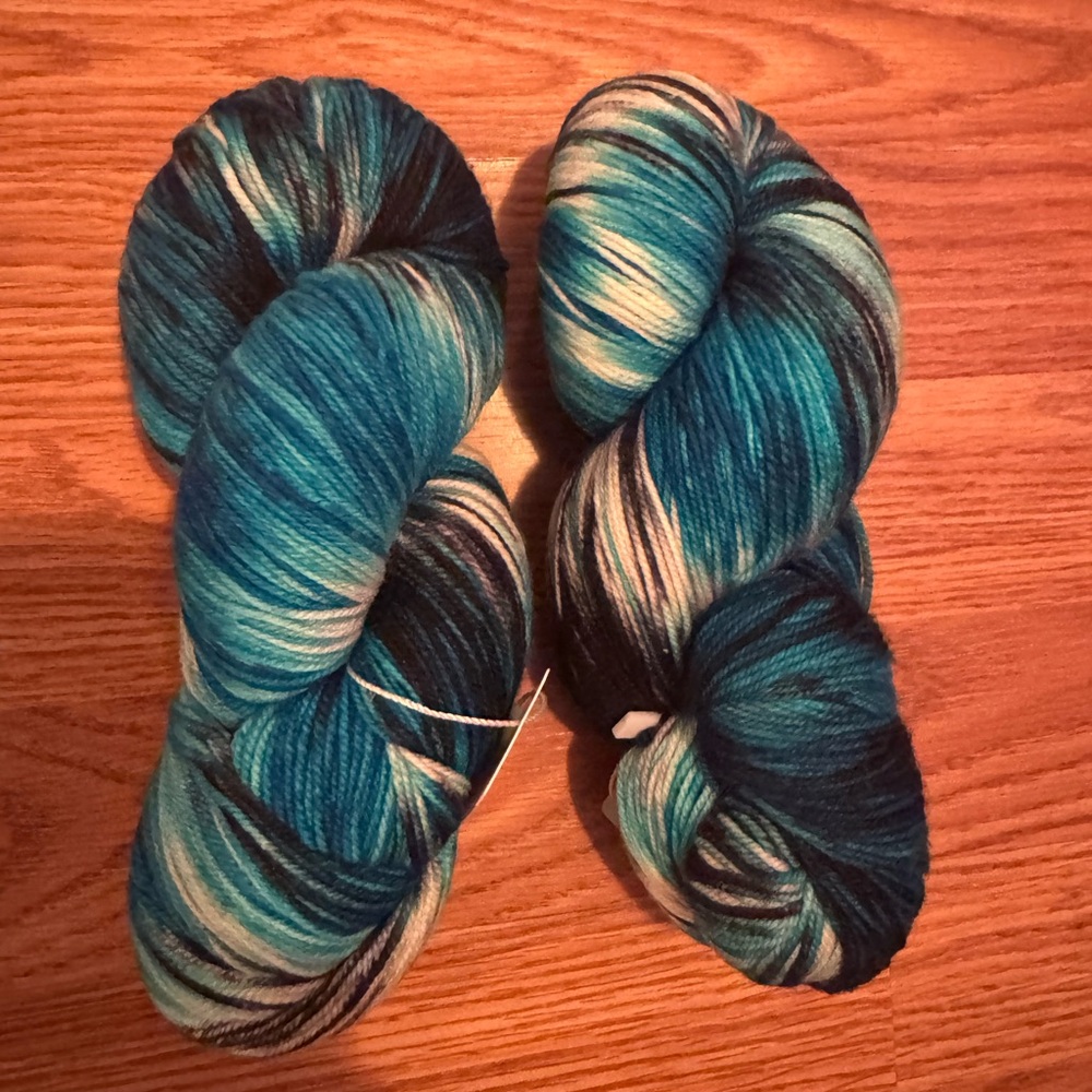 2 skeins Magpie Swanky Sock “Blue Monday “. See below for details.  NWT